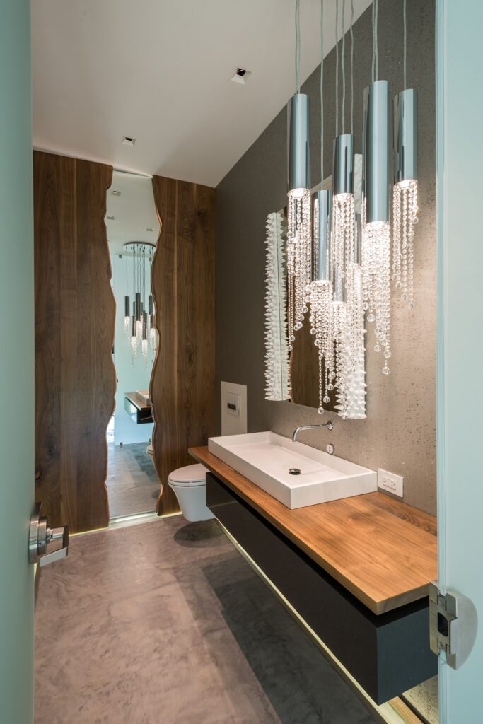 Bathroom with modern lighting and decor