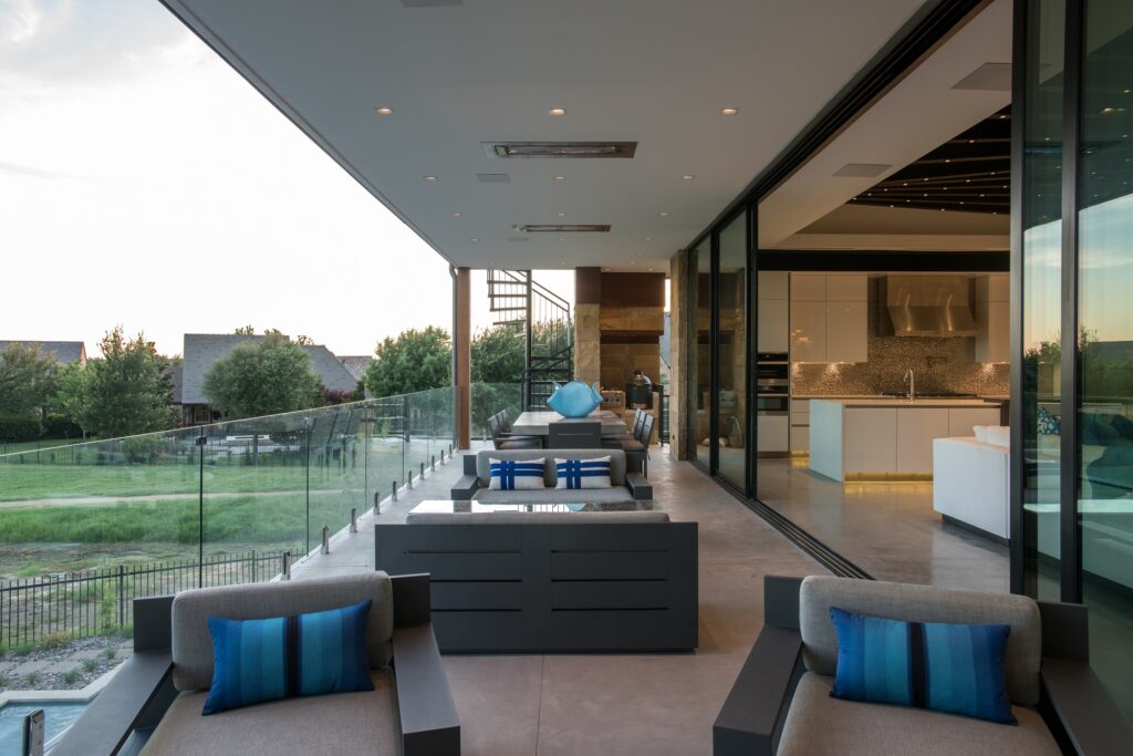 Second floor balcony deck with view of the pool