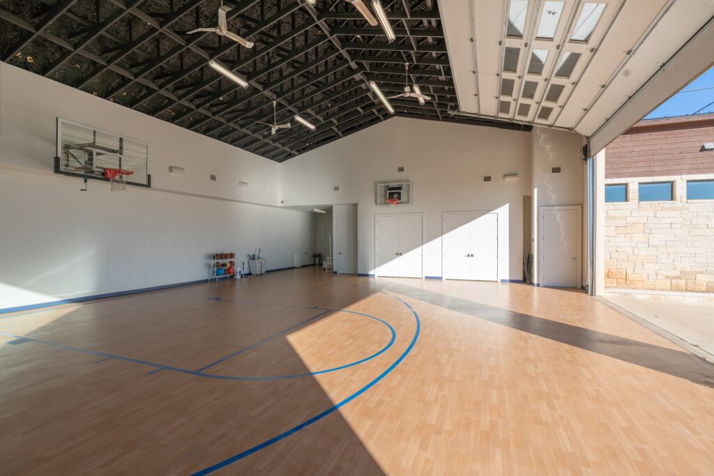Half basketball court with overhead door