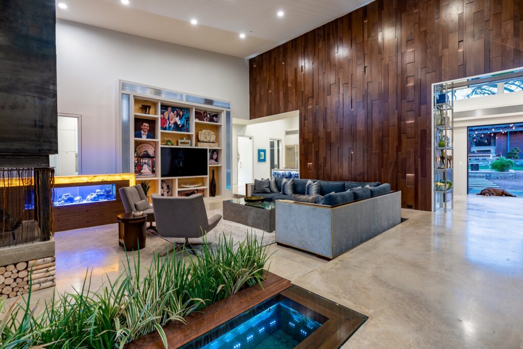 Large family room with fireplace and aquarium