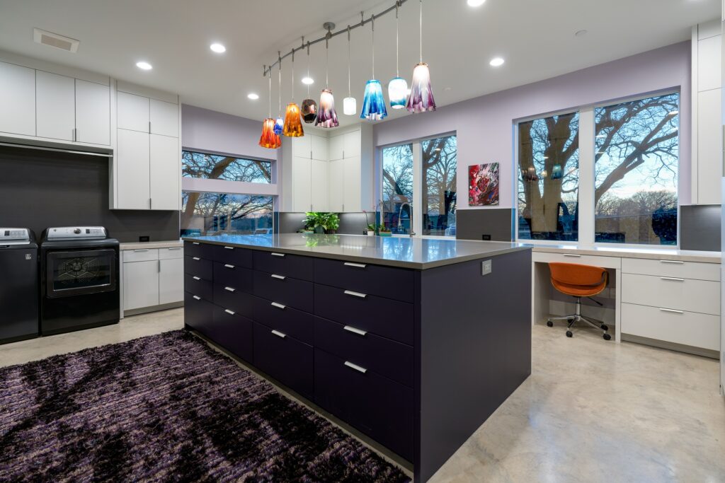 large laundry room with center island and desk